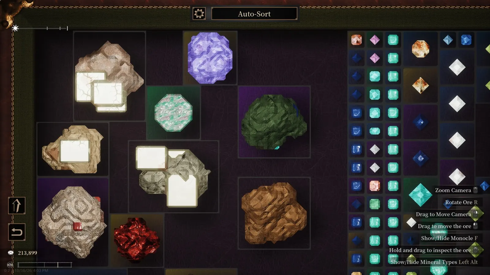 Subterranean mineral specimen tray displaying calcite cleavage blocks, amethyst druse, and malachite